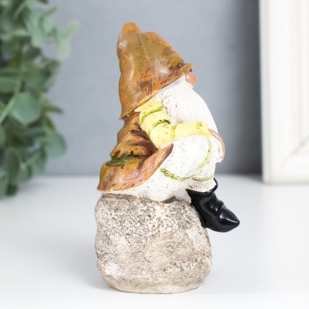 Polystone souvenir "Dwarf in an orange cap on a stone" 11x6.2x5.7 cm-1