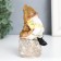 Polystone souvenir "Dwarf in an orange cap on a stone" 11x6.2x5.7 cm