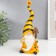 Polystone souvenir "Dwarf with a mushroom in a yellow striped cap" 25x11.5 cm