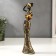 Souvenir Polystone "African with a jug, in an outfit with mirror mosaics" MIX 26x7x5 cm
