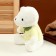 Soft toy "White Bear" in a green jacket, 26 cm