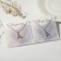 Kulons "Demetrons" Shock gesture, color silver-gold, l = 40 cm
