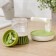 Brush with a dispenser for detergent and stand, green color