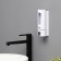 The dispenser for an antiseptic or liquid soap is mechanical, 400 ml, metal, white color