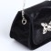 Female bag on a magnet, black color