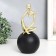 Souvenir Polystone "Abstraction. Man on the ball. Thoughts" Gold with black 10.5x10.5x25.5 cm