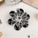 Asteria Brooch "Flower" asters, black color in silver