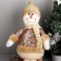 Soft toy "Snowman in sequins - long legs" sits, 13x52 cm, brown