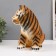 The piggy bank "Tiger red" height is 23.5 cm, width 16 cm, length 23 cm.