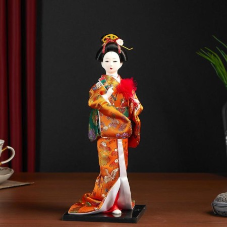 Collectible doll "Geisha in an orange kimono with a fan" 22.5 cm