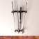 Holder for safe storage of fishing rods, wall-flowing, black