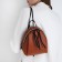 Women's backpack-Mini of artificial leather with lightning, brown color