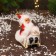 Santa Claus "in a suit with patterns and fur, on a sleigh" 13 cm, red-white