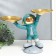 Souvenir Polystone stand "Cosmonaut in turquoise with two dishes" 14x26.5x32 cm