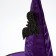 The carnival hat is “purple”, draped, with a bat, p. 56 - 58
