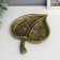 Decorative polystone plate "Sheet with a flower pattern" under brass 4x12x15 cm
