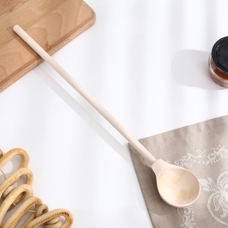 A wooden spoon for jam, without painting