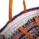 The bag is economic on the button, the color is red/multi -colored