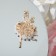 Brooch "Ballerina" Femininity, colored in gold