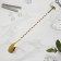 A barn spoon with stainless steel Madler, length 32 cm, gold color
