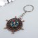 Metal keychain "Hot with a compass" 3.5x3.5x0.7 cm