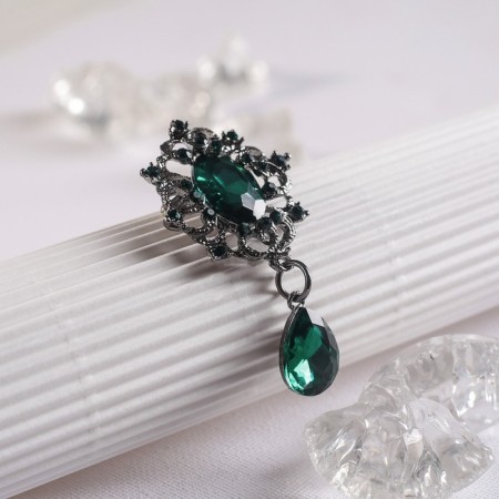 Brooch "Empress" of a monogram, emerald color in gray metal-1