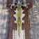 A souvenir sword on a tablet, a carved blade with a pattern, the claws of the eagle on the handle, the blade 41 cm