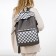 School backpack from textiles, 5 pockets, gray color