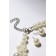 Set 2 objects: earrings, Kizel necklace scattering beads, white color, 42 cm