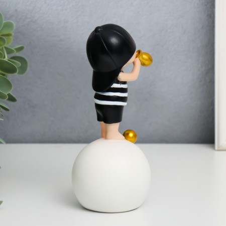 Polystone souvenir "Baby in a black cap, with a gold bubble on the ball" 15x7x7 cm-2
