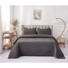 The bedspread and pillowcase 