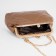 Clamp bag on the farmar, brown color