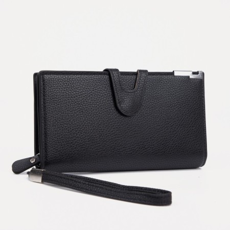 Men's purse on the button, a department for bills, for maps, for coins, black color