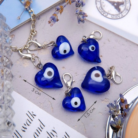 Charm "amulet" an eye in the heart, blue color in silver