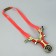 Metal slingshot with a laser target designator, compass