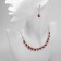 Set 2 objects: earrings, necklace “leaf fall” drops, red-white color in silver, 45cm