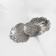 Cardigan clamp "feathers", white color in silver