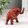 Souvenir Polystone "Elephant in the Golden Popone with Red Stone" 7.5x3x5 cm