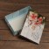 The box is folding, the lid is "a gift for someone who behaved well" 24 x 17 x 8 cm
