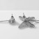 Hanging earrings with rhinestones "Butterfly" and a circle, black and white color in silver