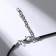 Pendant on the lace "lizard", color black silver on a black lace, 40 cm
