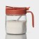 Glass sugar tower with a spoonful of the Coral shares, 8 × 11.5 cm