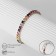 Bracelet with rhinestones "shine" on a puff, colored in gold