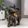 Polystone souvenir "Two elephants of African brown" gold ears 11x12x5.5 cm