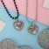 Kulons "Demetrons" Two hearts with flowers, black-silver color, 45 cm