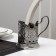 The cup holder "Troika", D = 72mm, nickel, with blackening