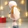 Interior doll "Girl in a pink fur coat and in a hat with ears" 38x11x16 cm