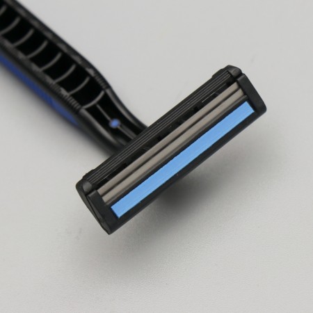 A razor of extras with two stainless blades with a moisturizing strip, shaving cream10 gr.-2