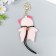 A keychain to the leatherette with carbine "Puccum Glazai Pig" 10x7.6 cm