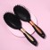 The comb massage, rubberized pen, 8 × 24 cm, black/golden color